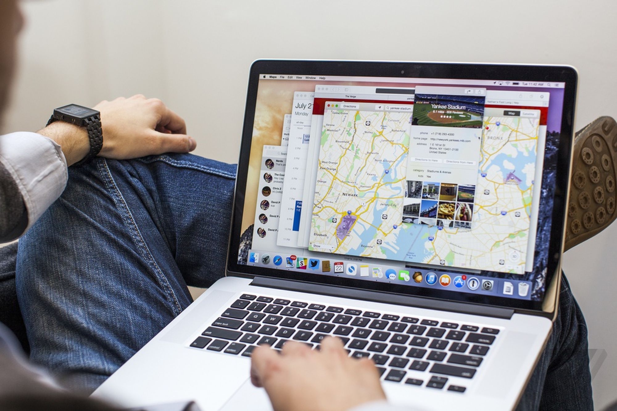 A person using MacBook Pro with Mac OS installed in it