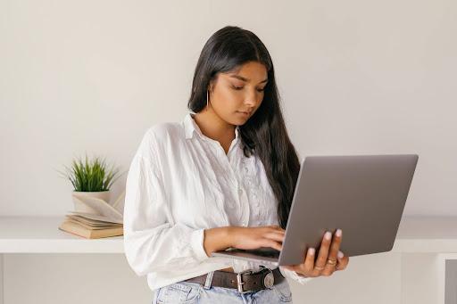 a girl using a laptop